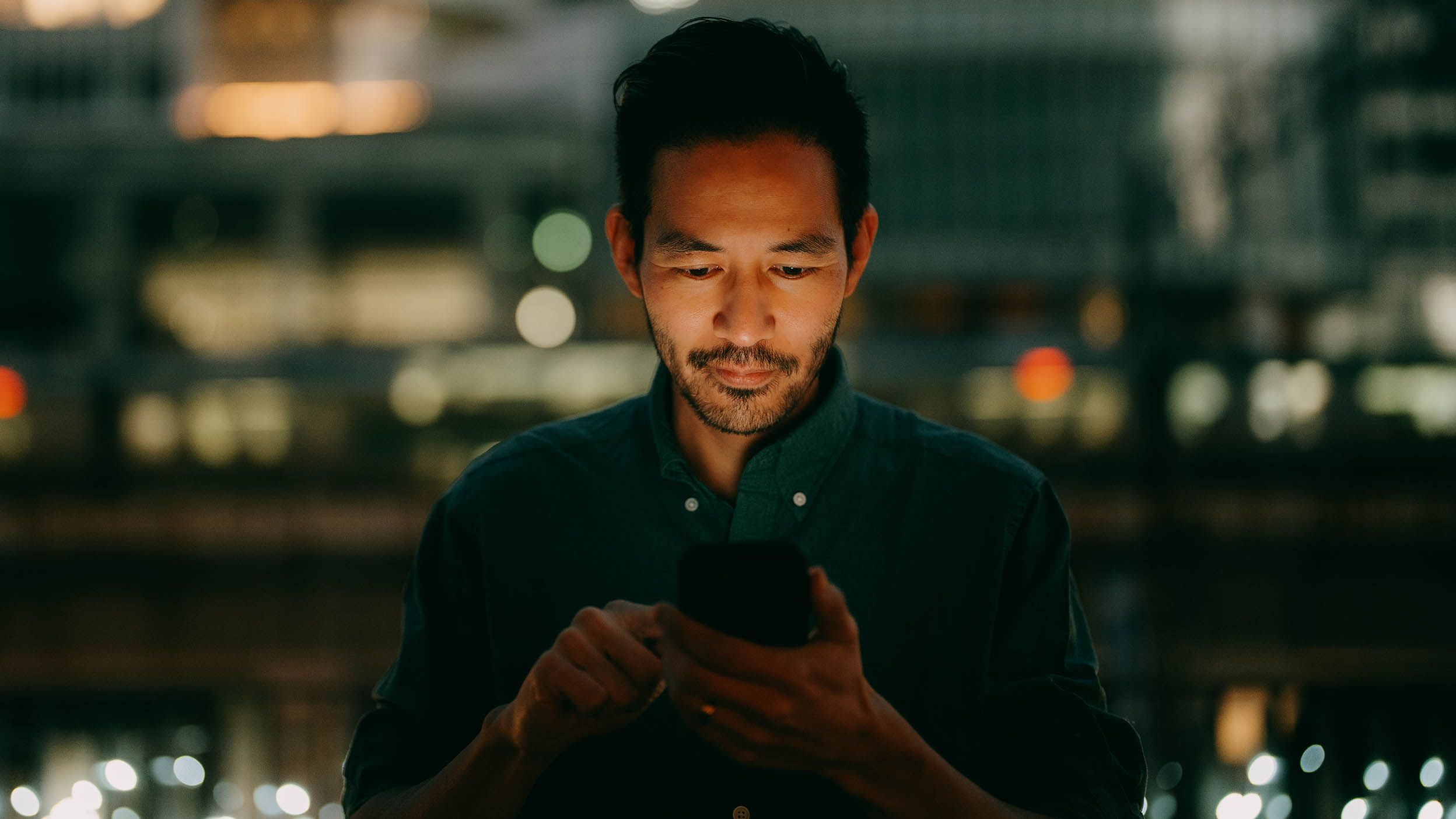 Person looking at his phone