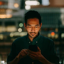 Person%20looking%20at%20his%20phone