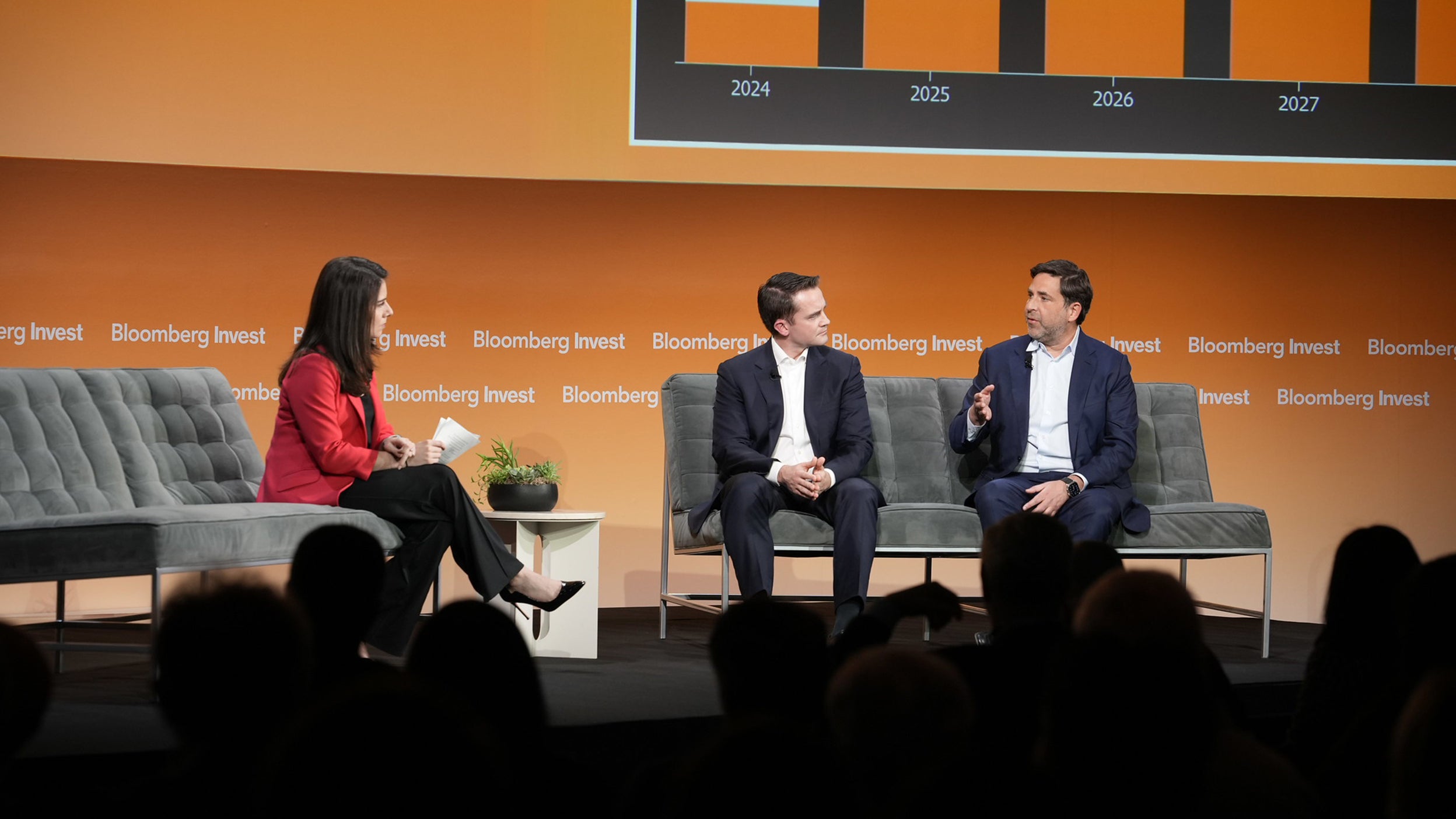 Andrew and others in a conference