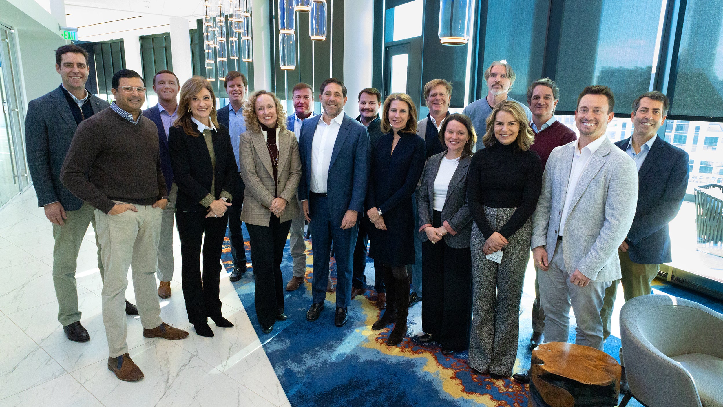 Employees standing in ATL office