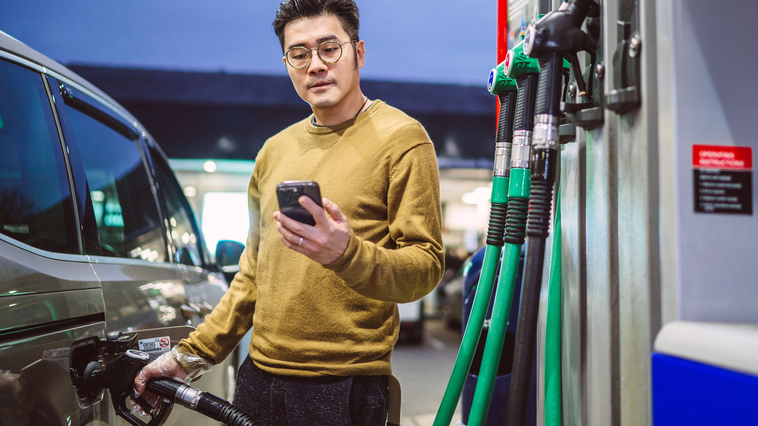 Person filling up gas