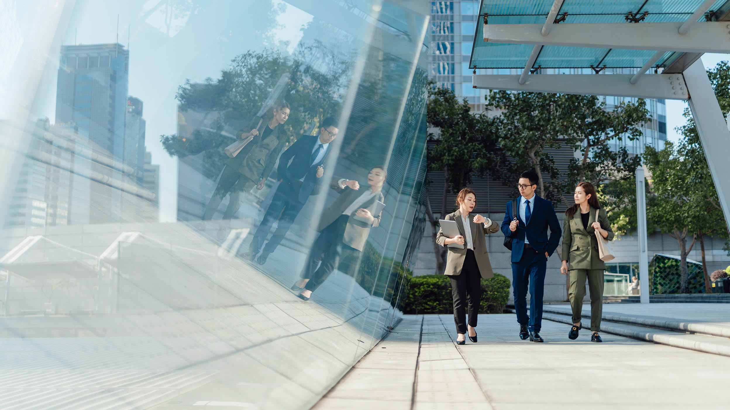 Busy modern workplace. Working process in the office, business people working, walking and talking, blurred motion