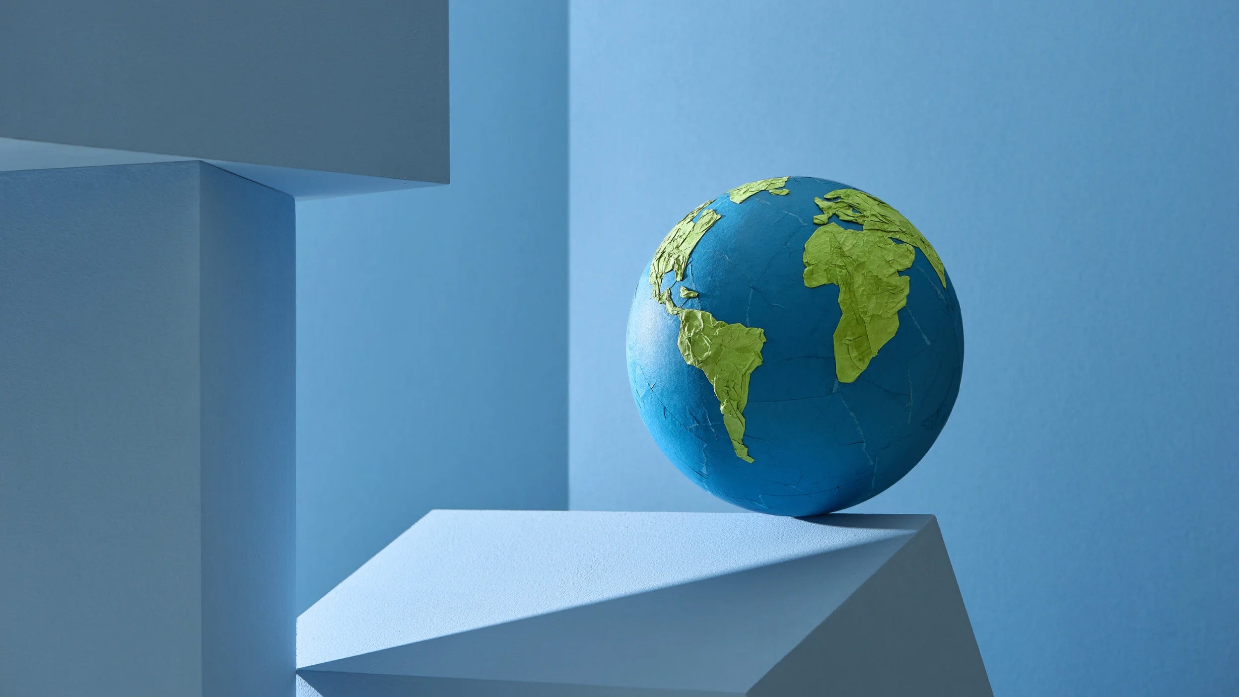 Globe balanced on a ledge