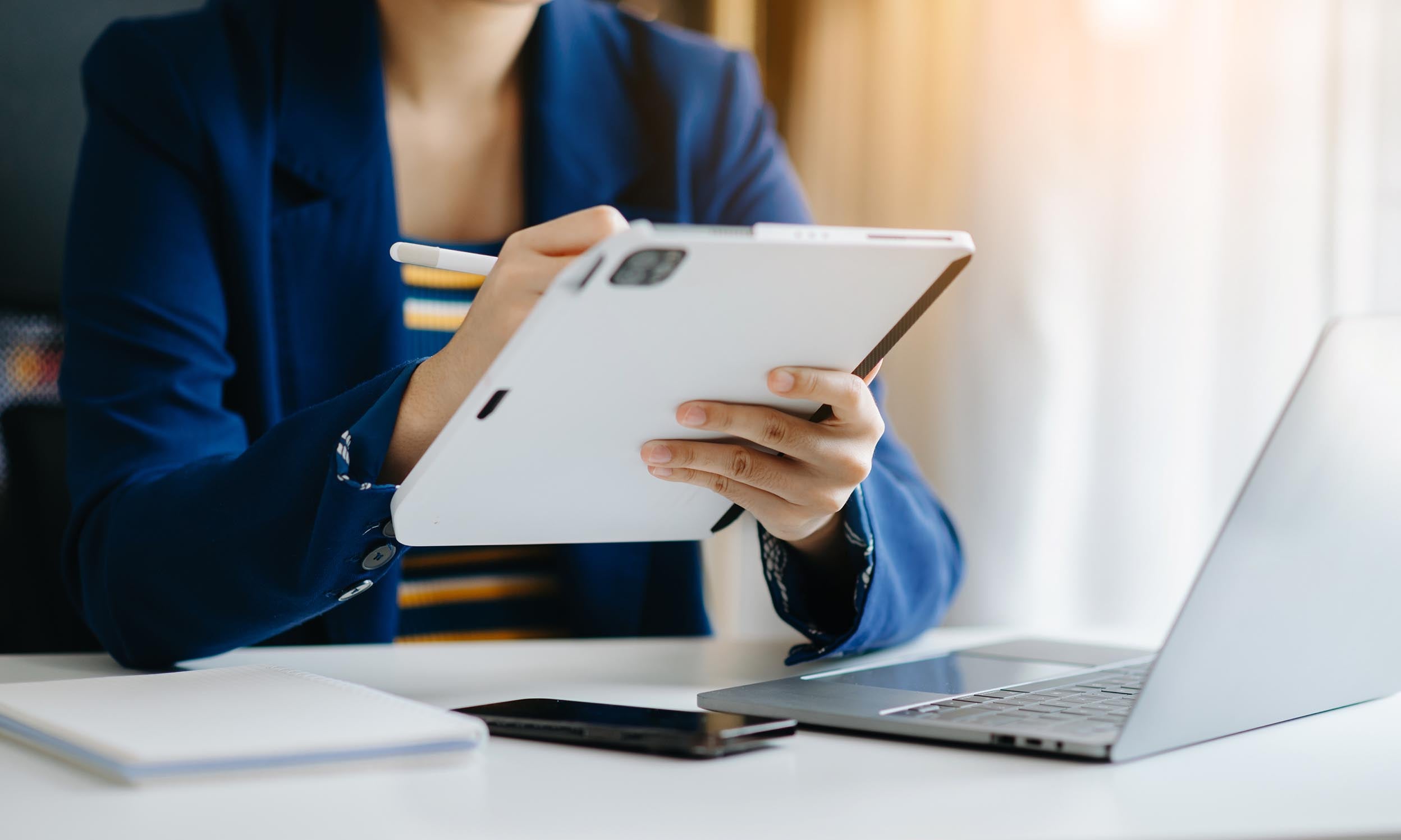 Woman working in the tab