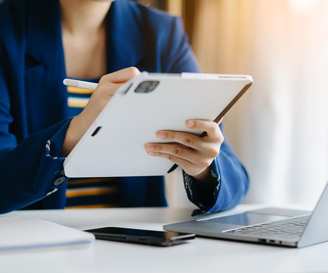 Woman working in the tab
