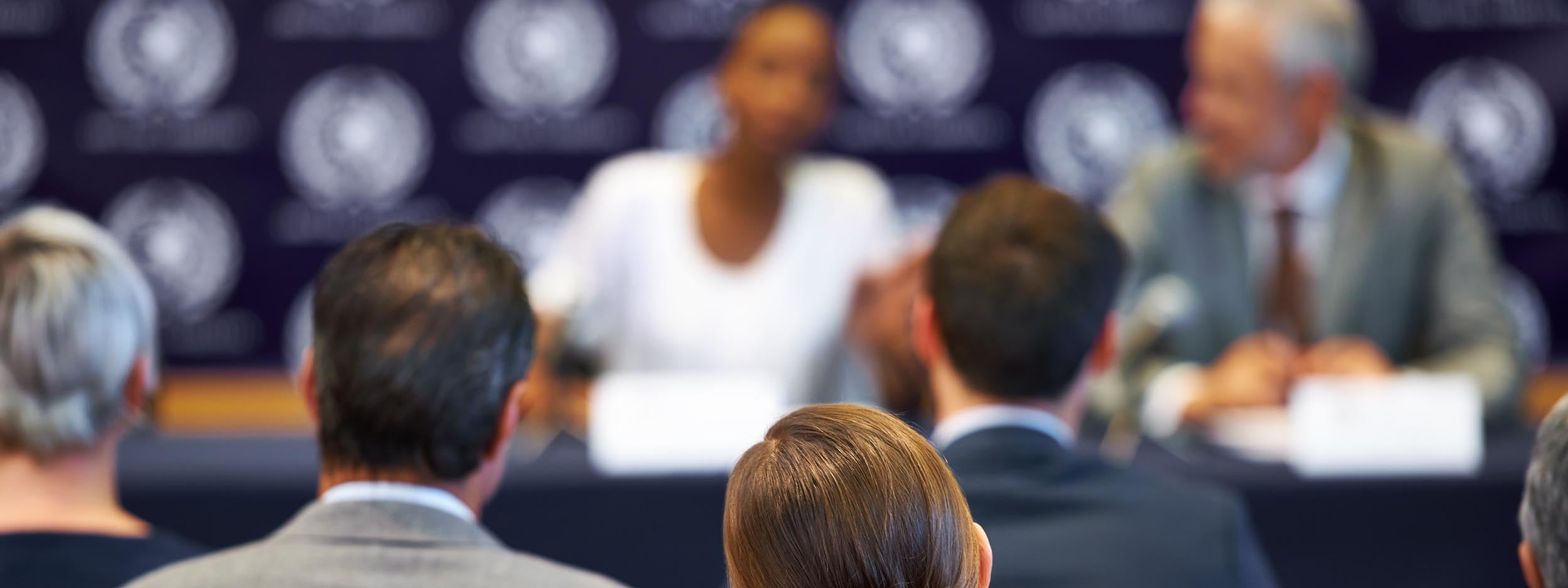 people listening to the panel discussion