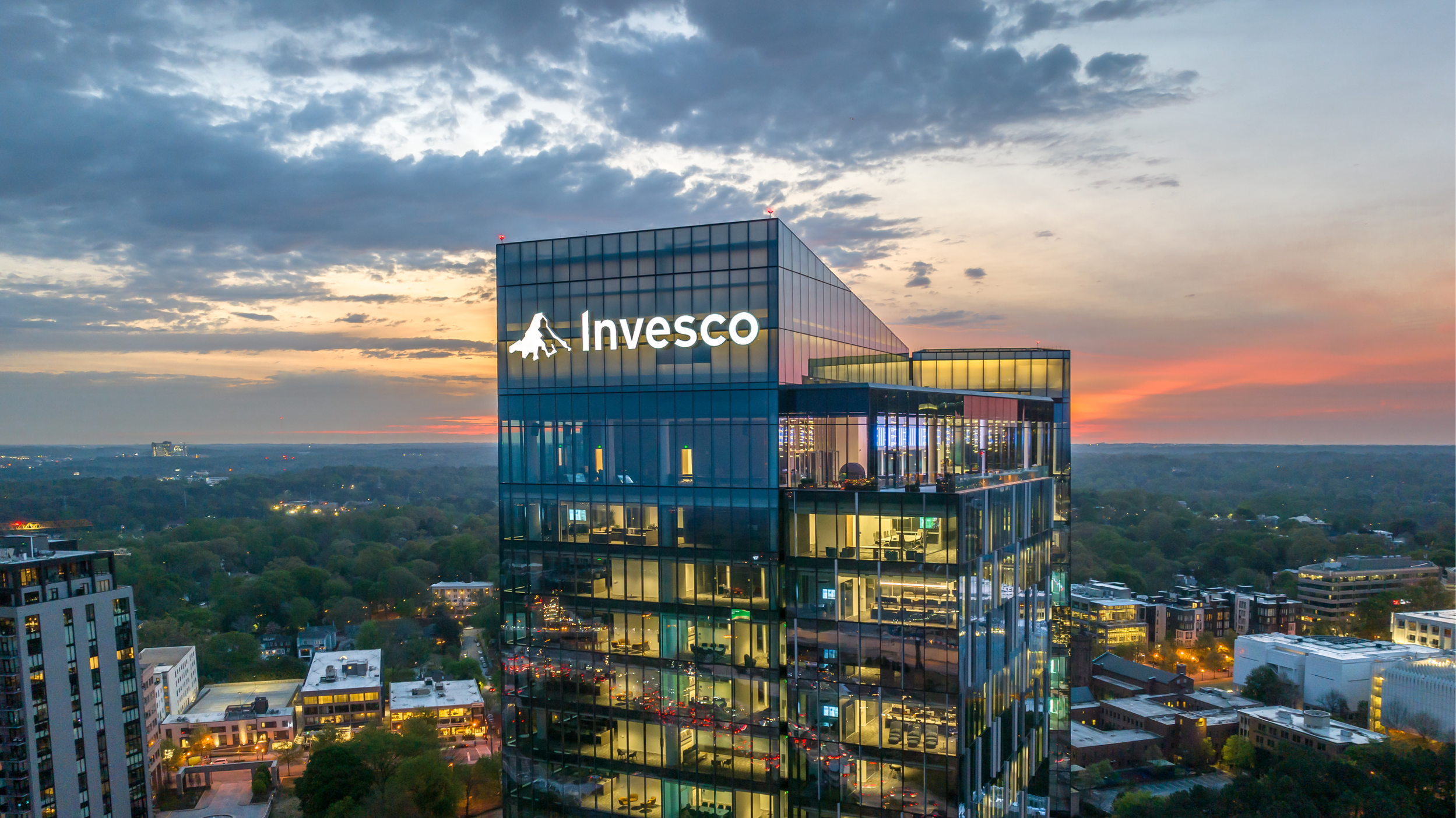 Close-up of Invesco headquarters building against skyline