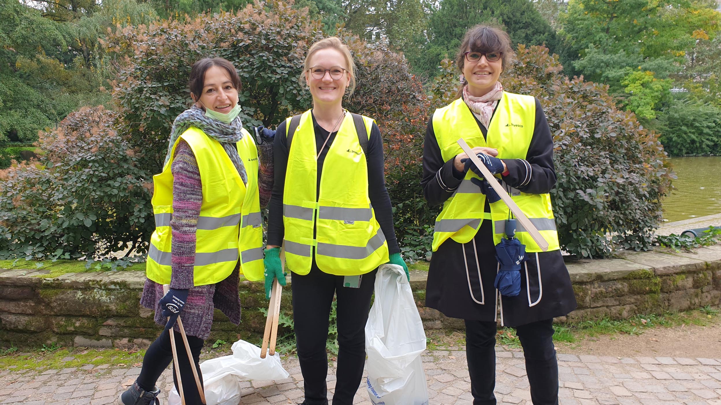  Henley employees doing a litter cleanup