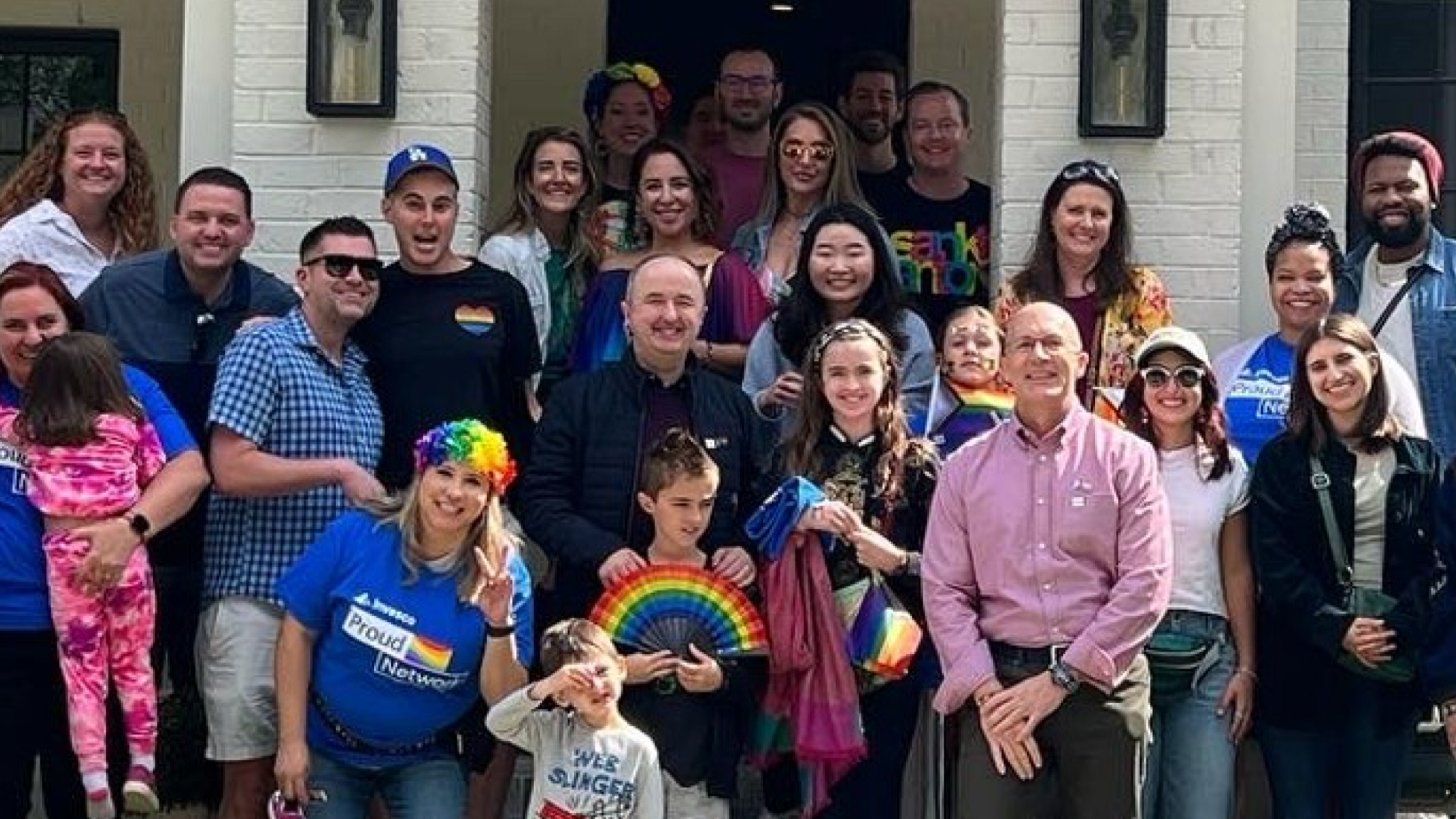 Group of Invesco Atlanta employees celebrating Pride Parade