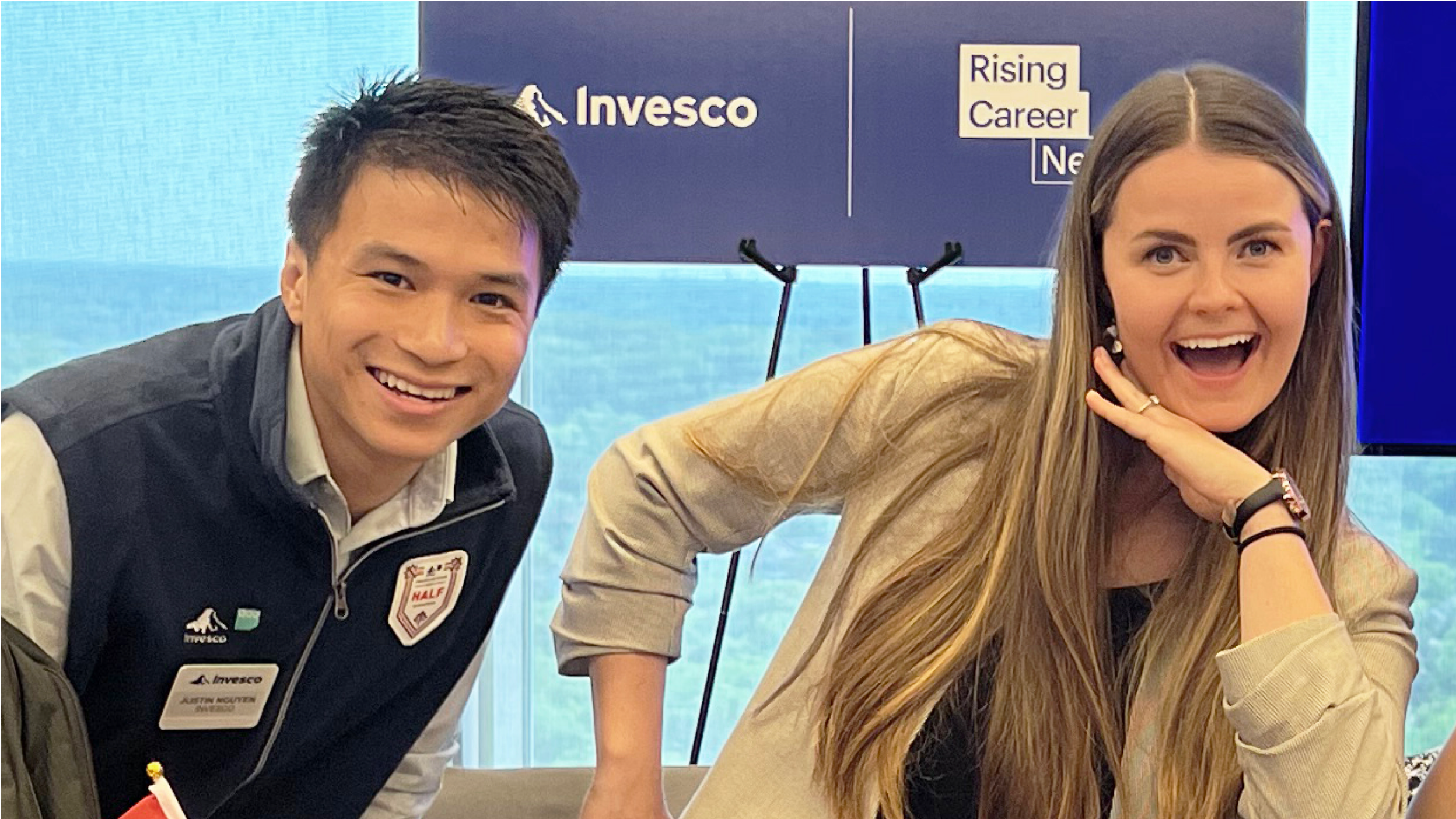 Young professionals at Invesco promoting upcoming events