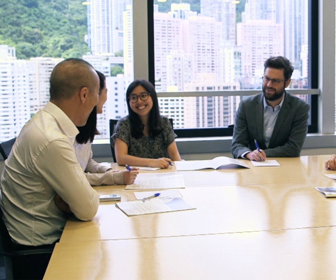 diverse group of people in conference room