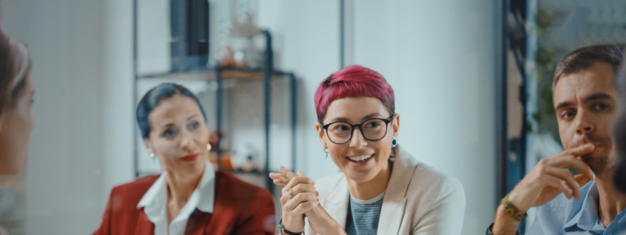 Group of diverse employees at meeting