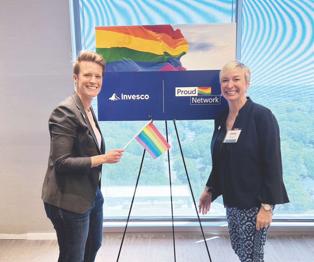 Invesco Proud Network members promoting upcoming LGBTQIA+ events