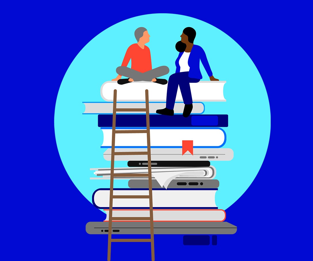 Graphic of two people sitting on books