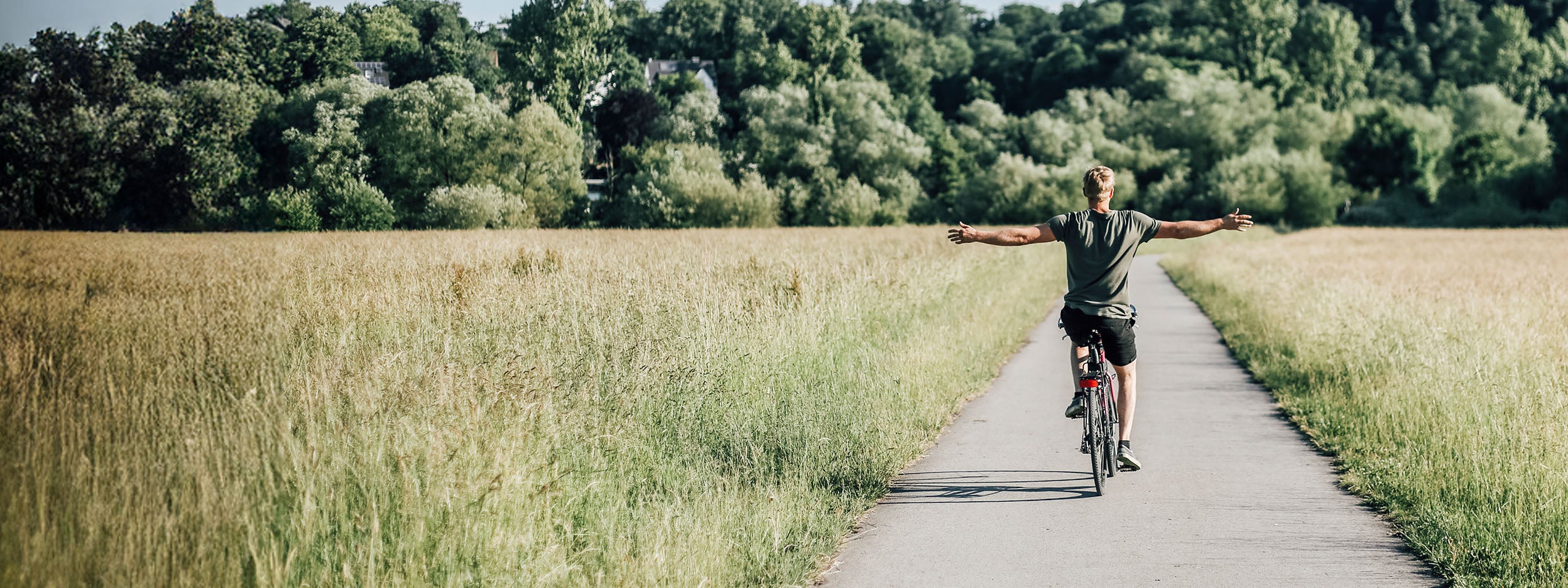 Man riding bike in the countryside