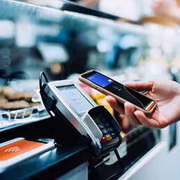 Person%20using%20a%20cellphone%20to%20pay%20for%20something.