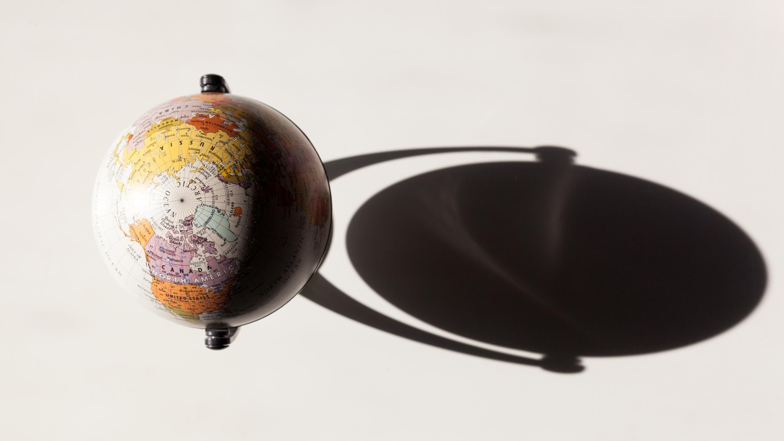 Globe casting a shadow