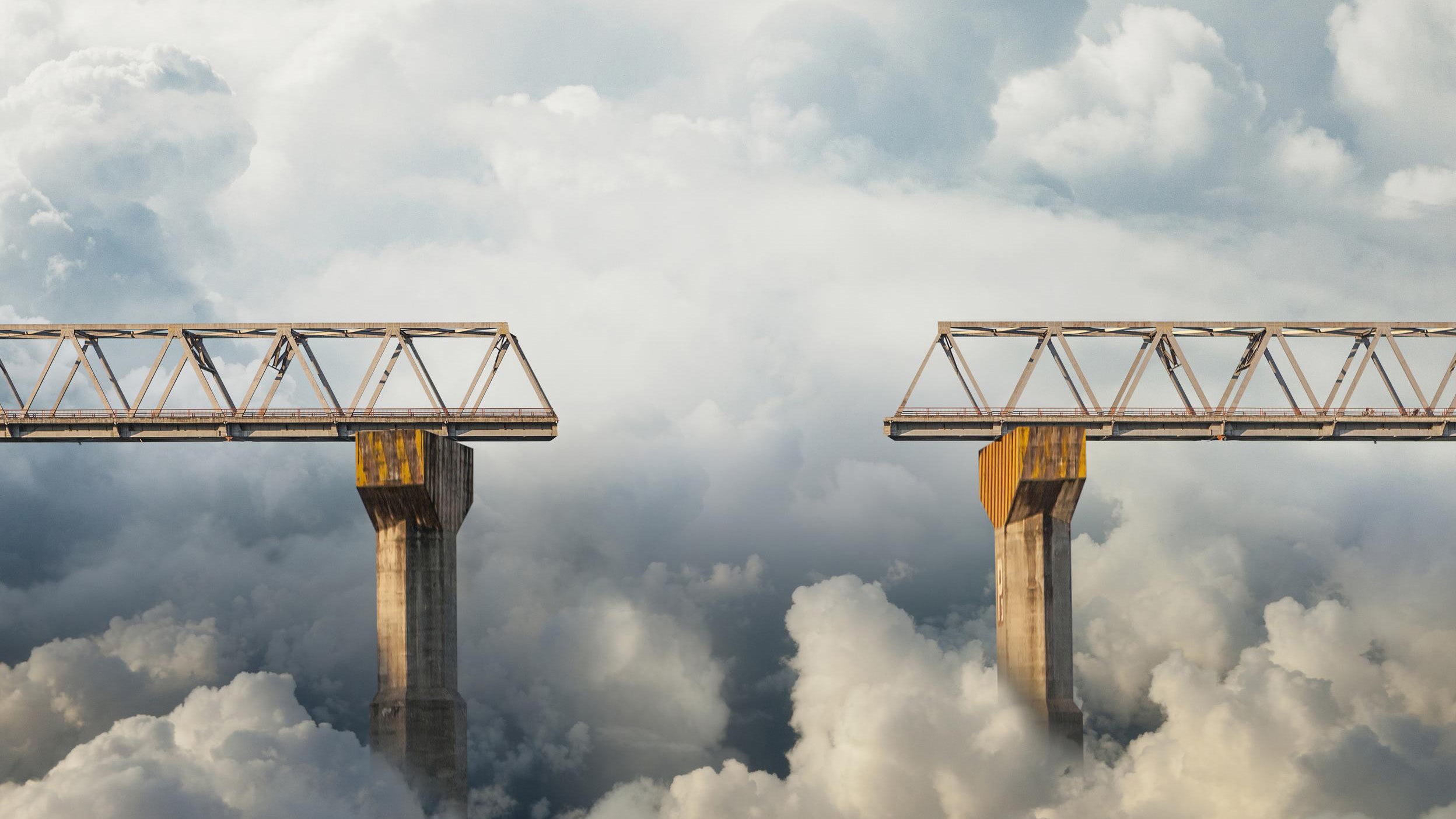 Clouds surrounding gap in bridge