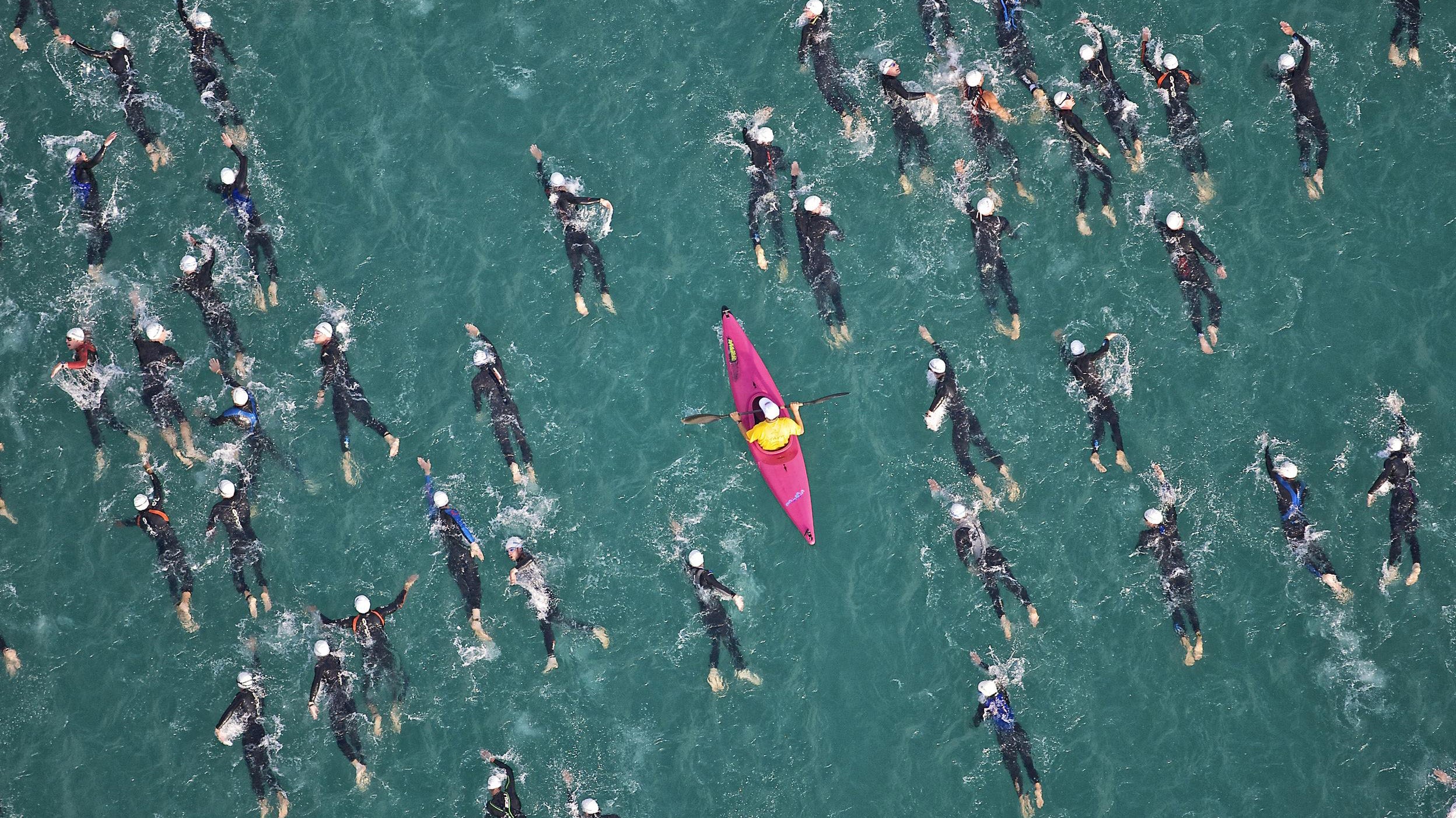 swim at Ironman Austria. from helicopter.Ironman Austria long day picturing friends and pro's for Triangle.