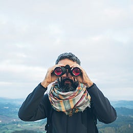 Man%20using%20binoculars.