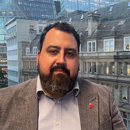 scrrenshot%20of%20David%20Aujla%20talking%20in%20the%20video