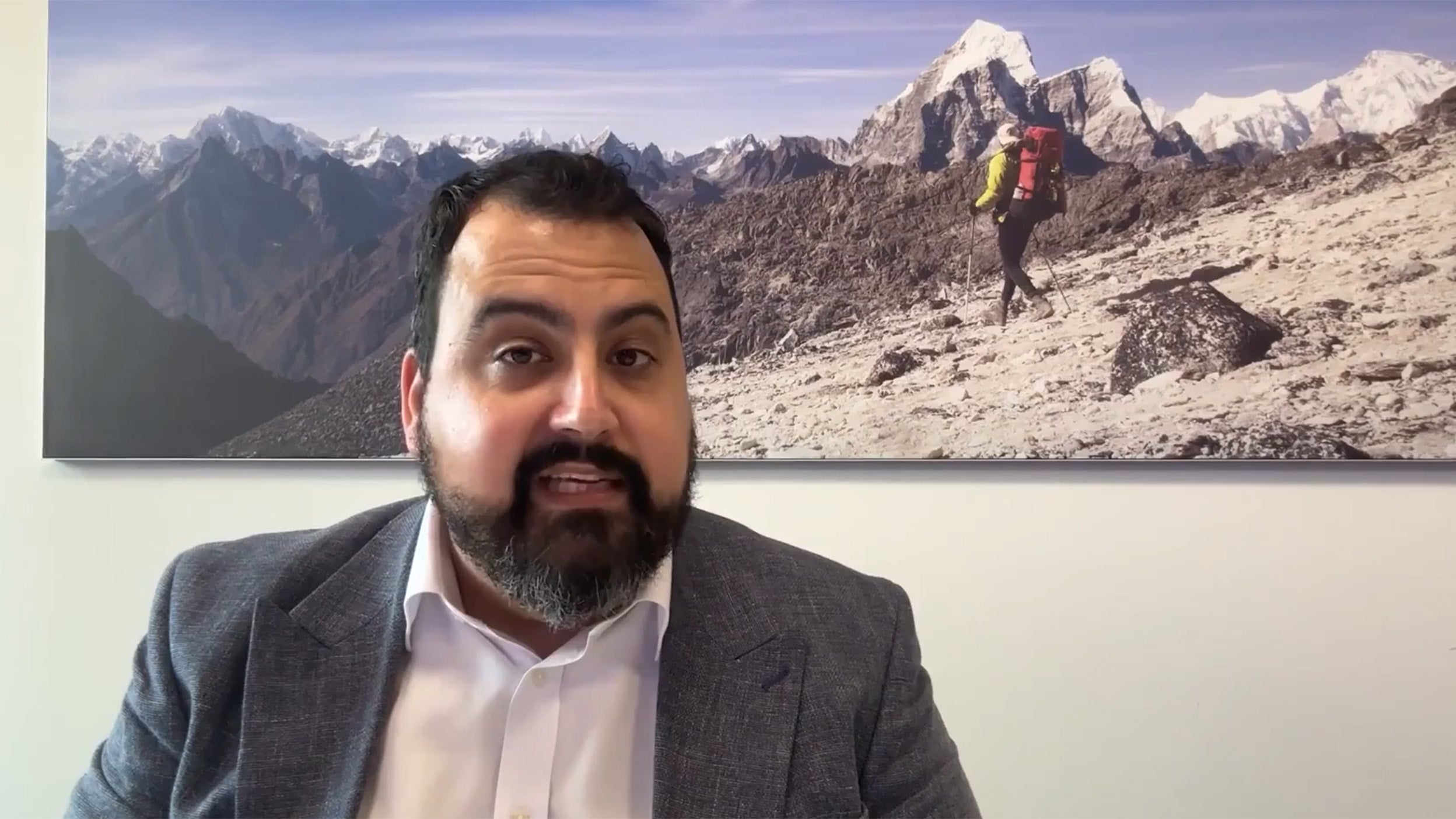 scrrenshot of David Aujla talking in the video