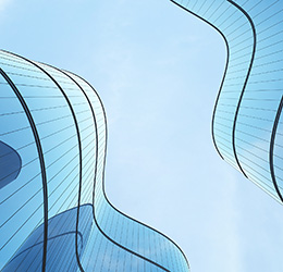 Low%20angle%20view%20of%20futuristic%20architecture,%20Skyscraper%20of%20office%20building%20with%20curve%20glass%20window,%203D%20rendering.