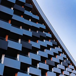 Modern%20building%20with%20square%20balconies%20seen%20from%20below.%20Modern%20architecture.