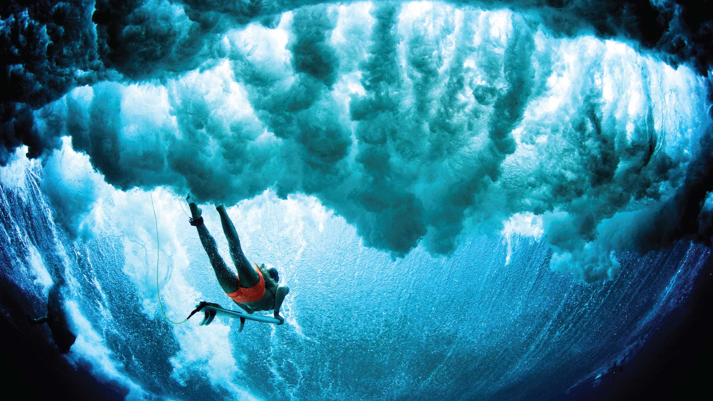 woman diving into the ocean