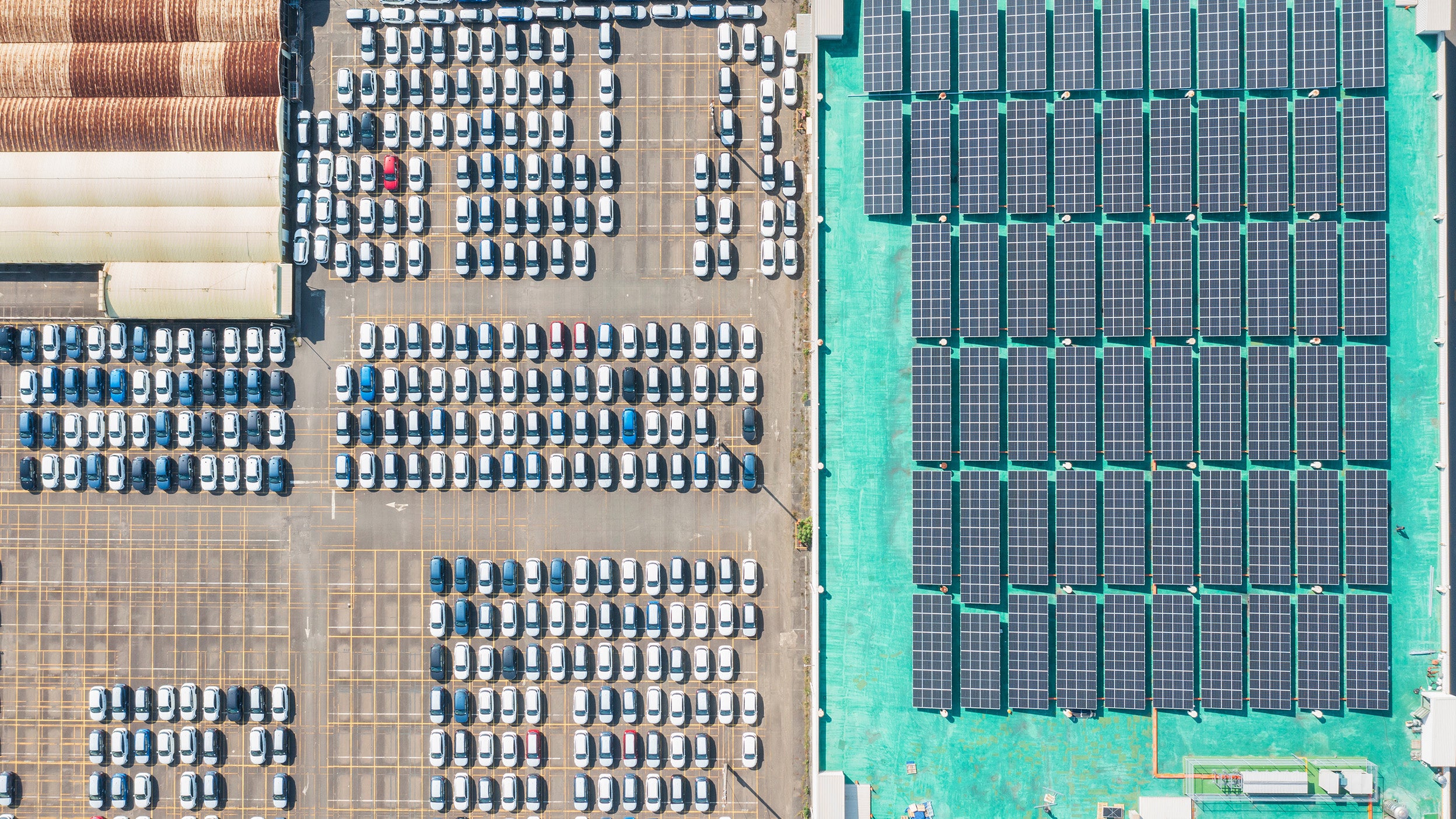 Car Dealership with Solar Power and Parking Overview