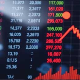 Stock%20market%20graph%20displayed%20on%20a%20computer%20monitor,%20showing%20fluctuating%20trends%20and%20data%20points%20over%20time