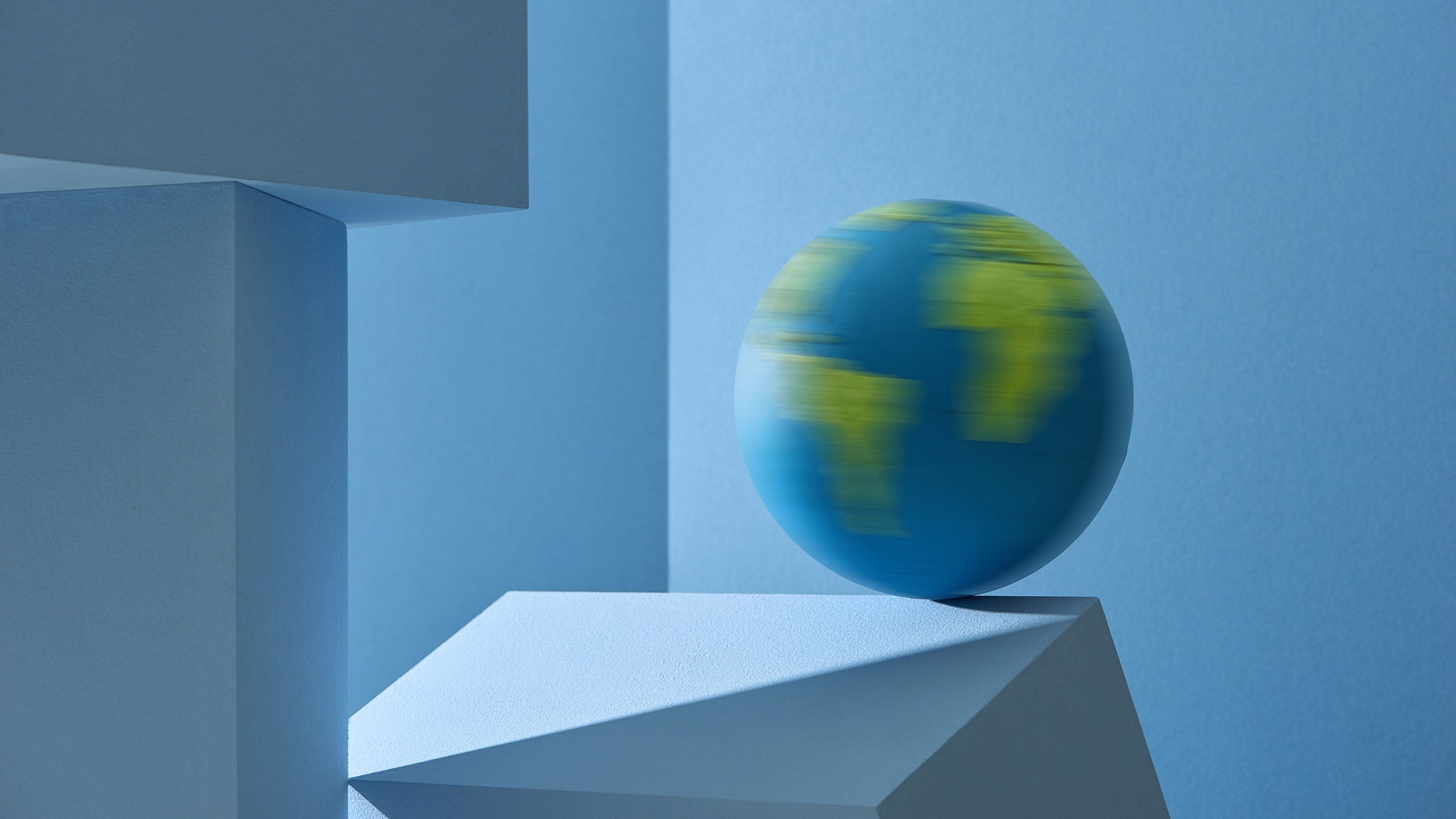 Rotating globe on platform