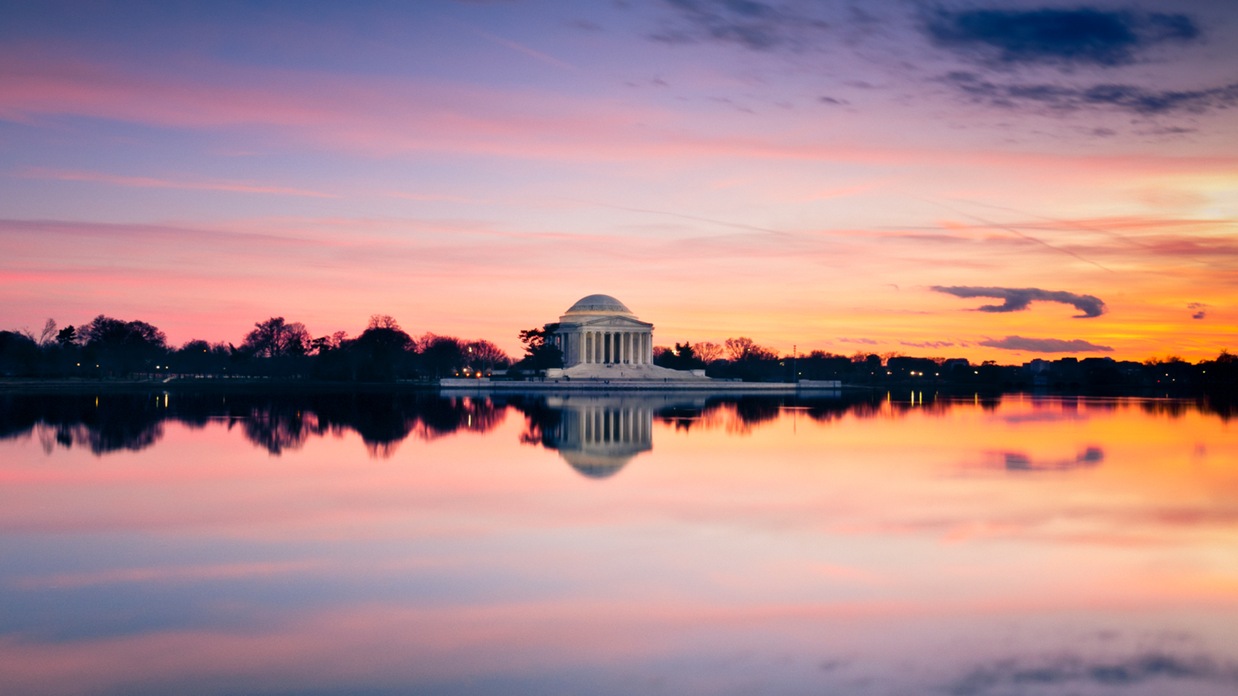 Blurred motion view of traffic driving on highway underpass