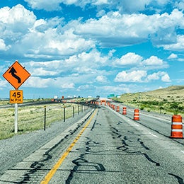 Interstate%2080%20expressway%20highway%20road%20construction%20zone%20detour%20in%20the%20western%20USA%20state%20of%20Wyoming%20on%20a%20bright%20summer%20puffy%20cumulus%20cloud%20day.