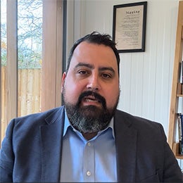 scrrenshot%20of%20David%20Aujla%20talking%20in%20the%20video