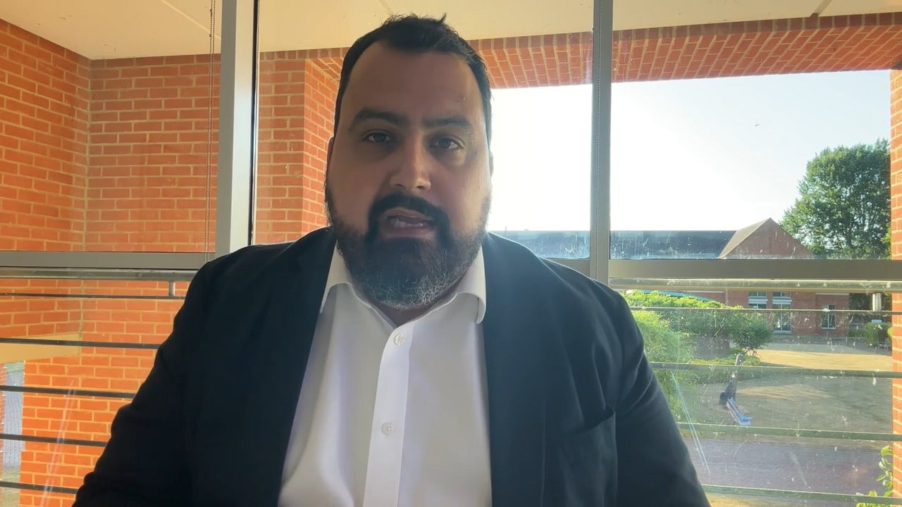 scrrenshot of David Aujla talking in the video