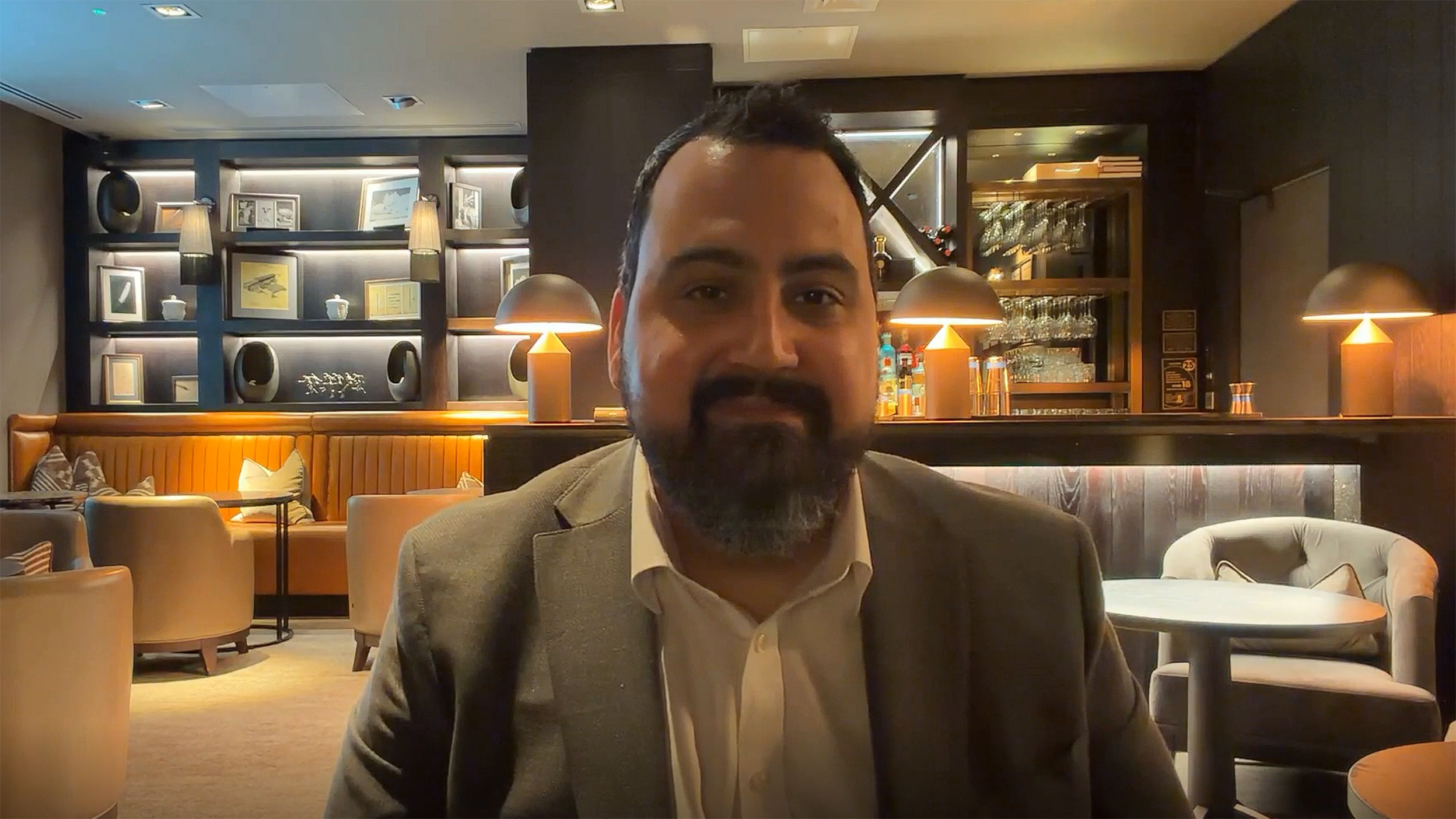 scrrenshot of David Aujla talking in the video