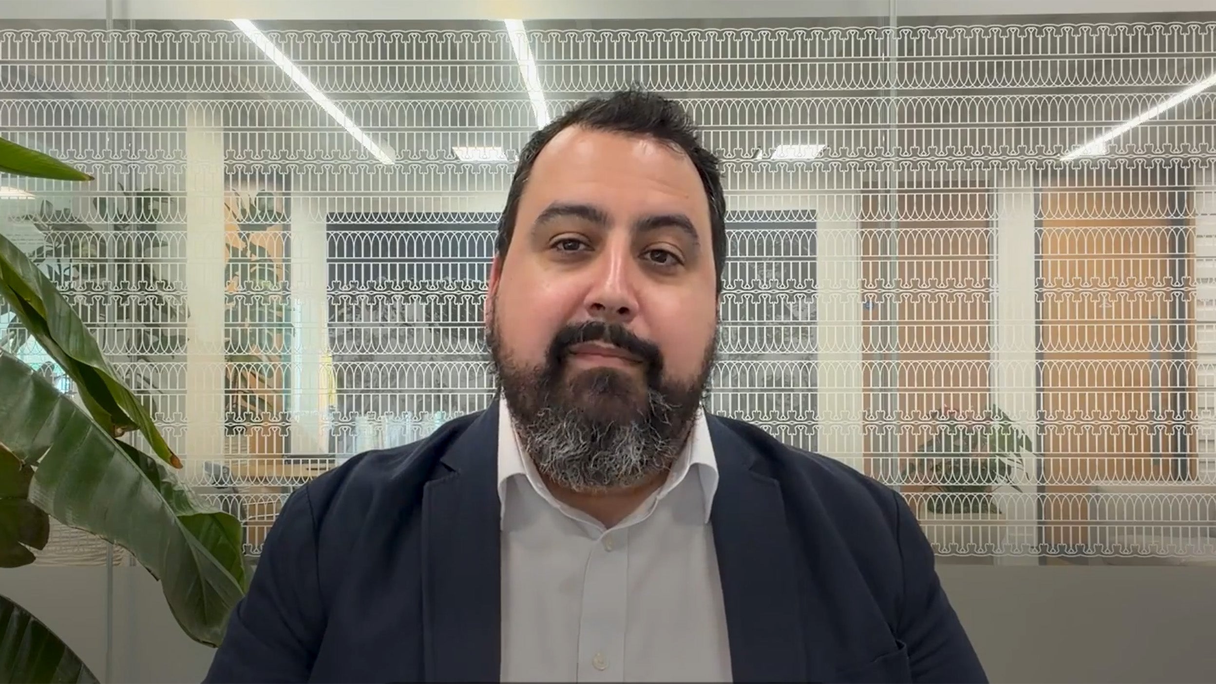 scrrenshot of David Aujla talking in the video