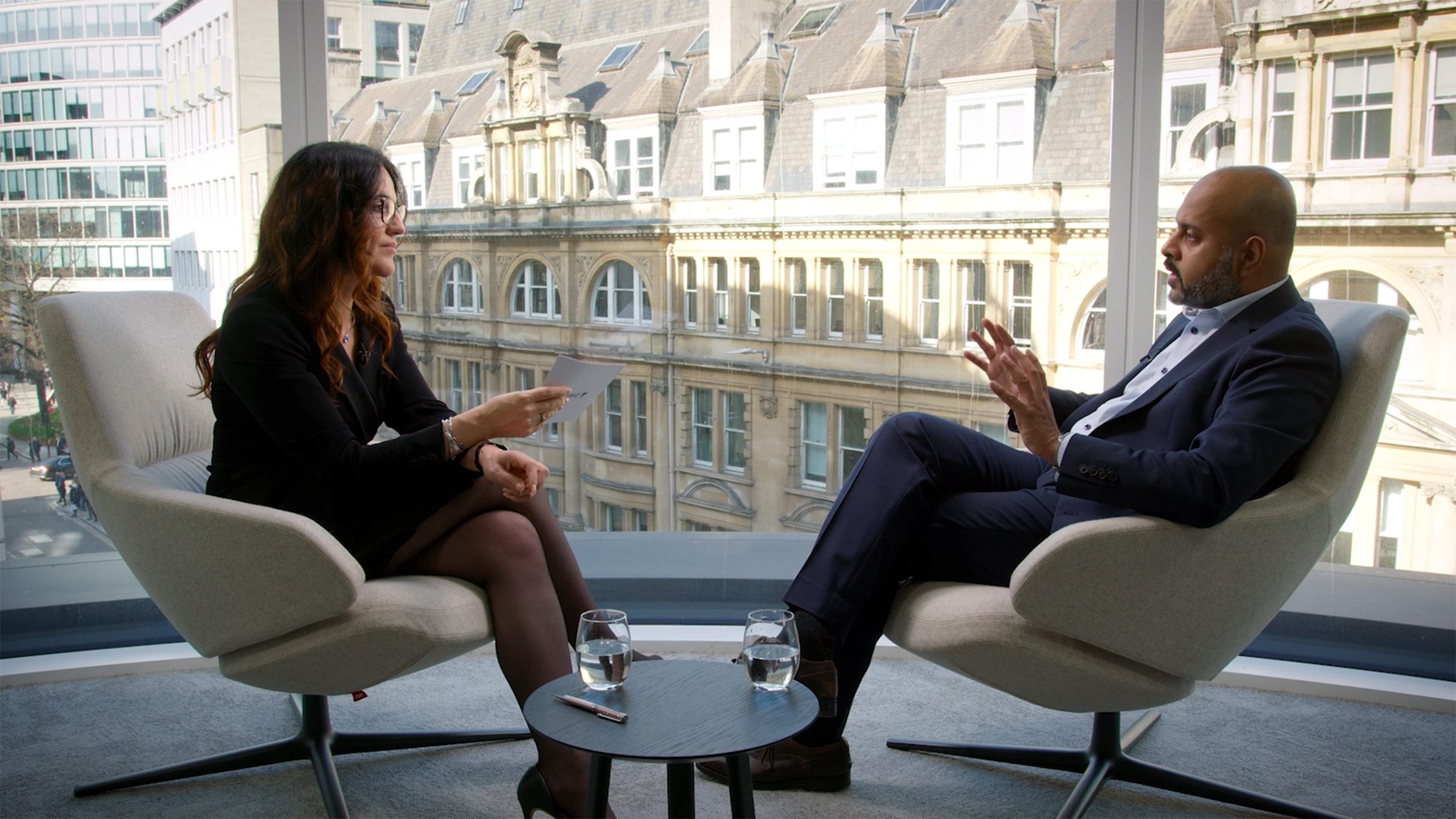 Screenshot of Mary Cahani talking with Maiyuresh Rajah, Director of Investments at Aviva in the video