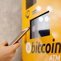 Contactless%20ATM%20machine%20for%20payment%20by%20Bitcoin%20cryptocurrency.%20Concept%20pay%20mobile%20phone.