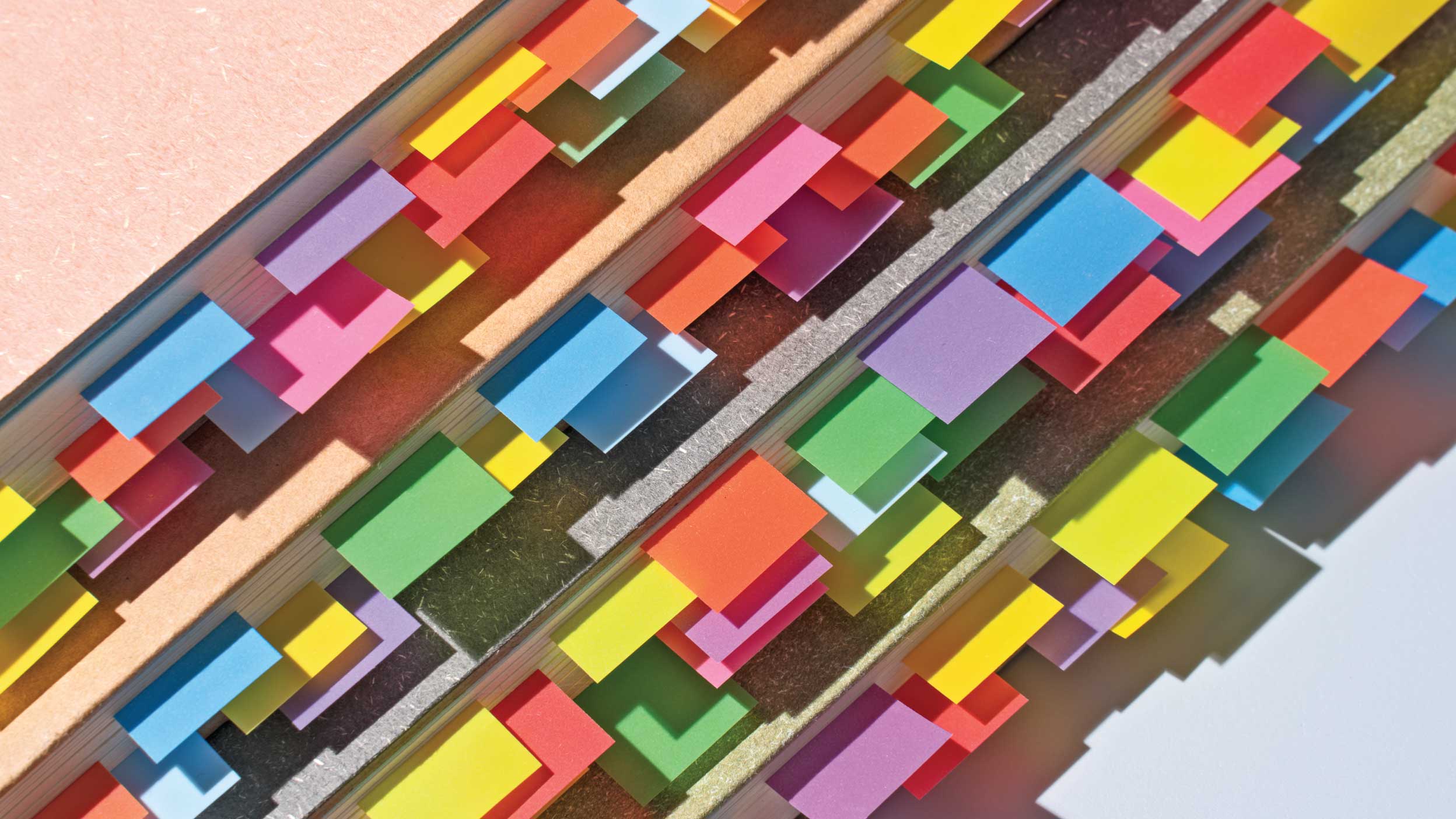 A close up of multiple pipelines with the sunset in the background