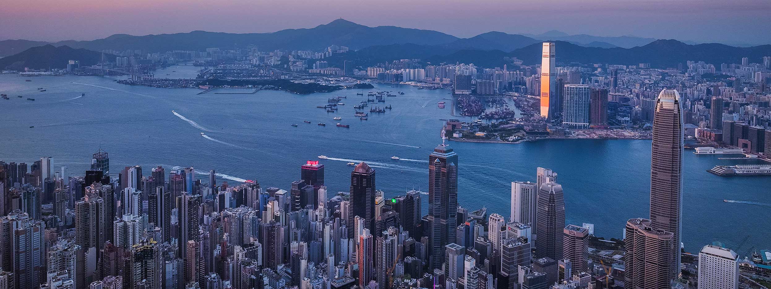 City skyline and harbour at dusk