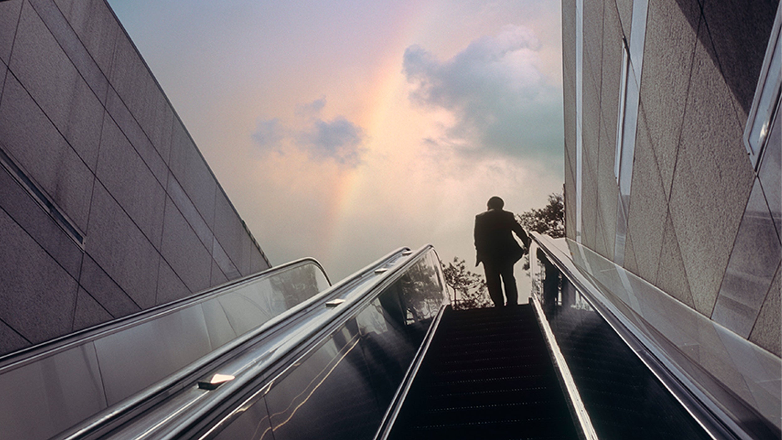 A person using escalator