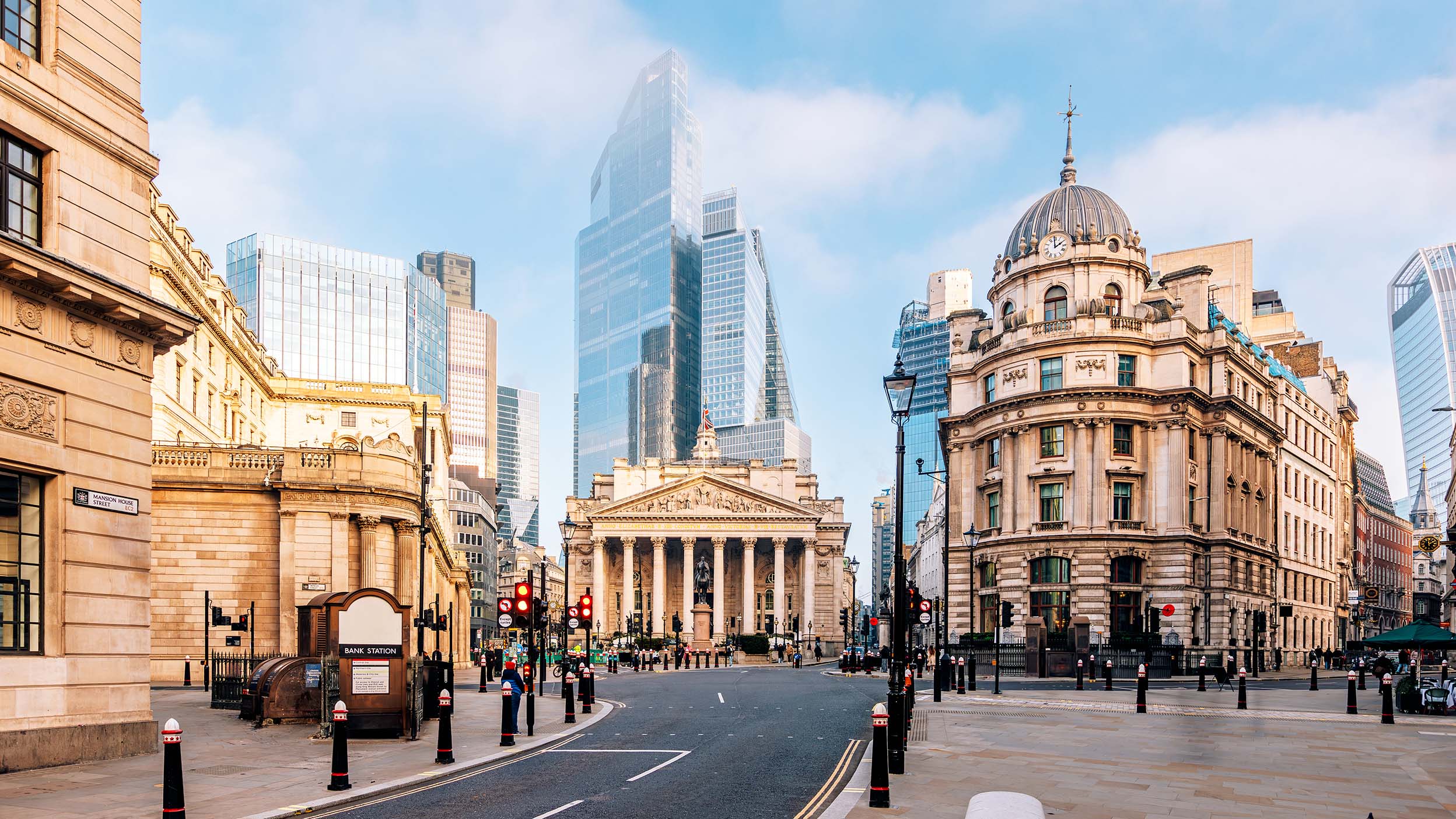London financial district with historic Royal Exchange building and Bank of England, UK