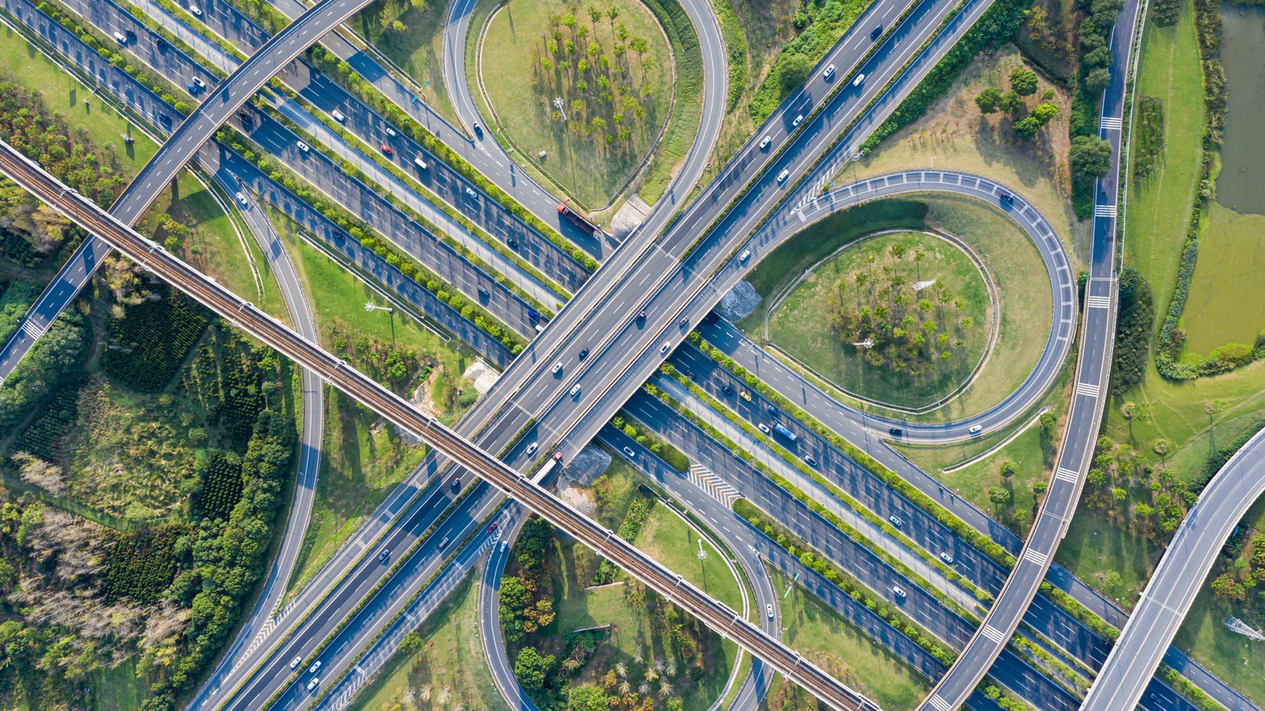 Aerial view of highway and overpass in city