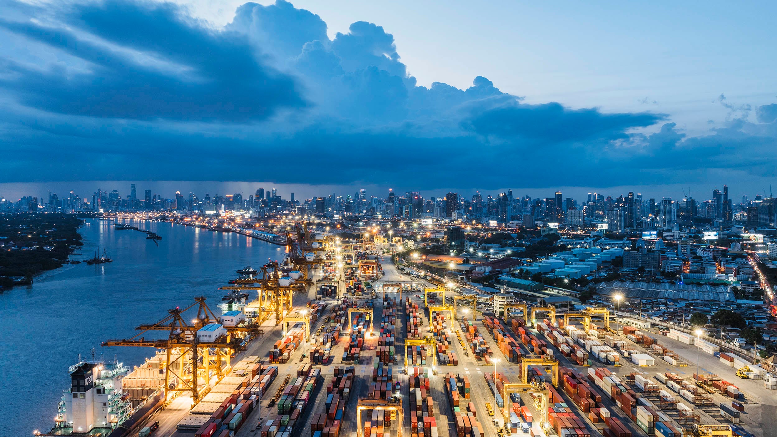 An elevated view of commercial docks at dusk