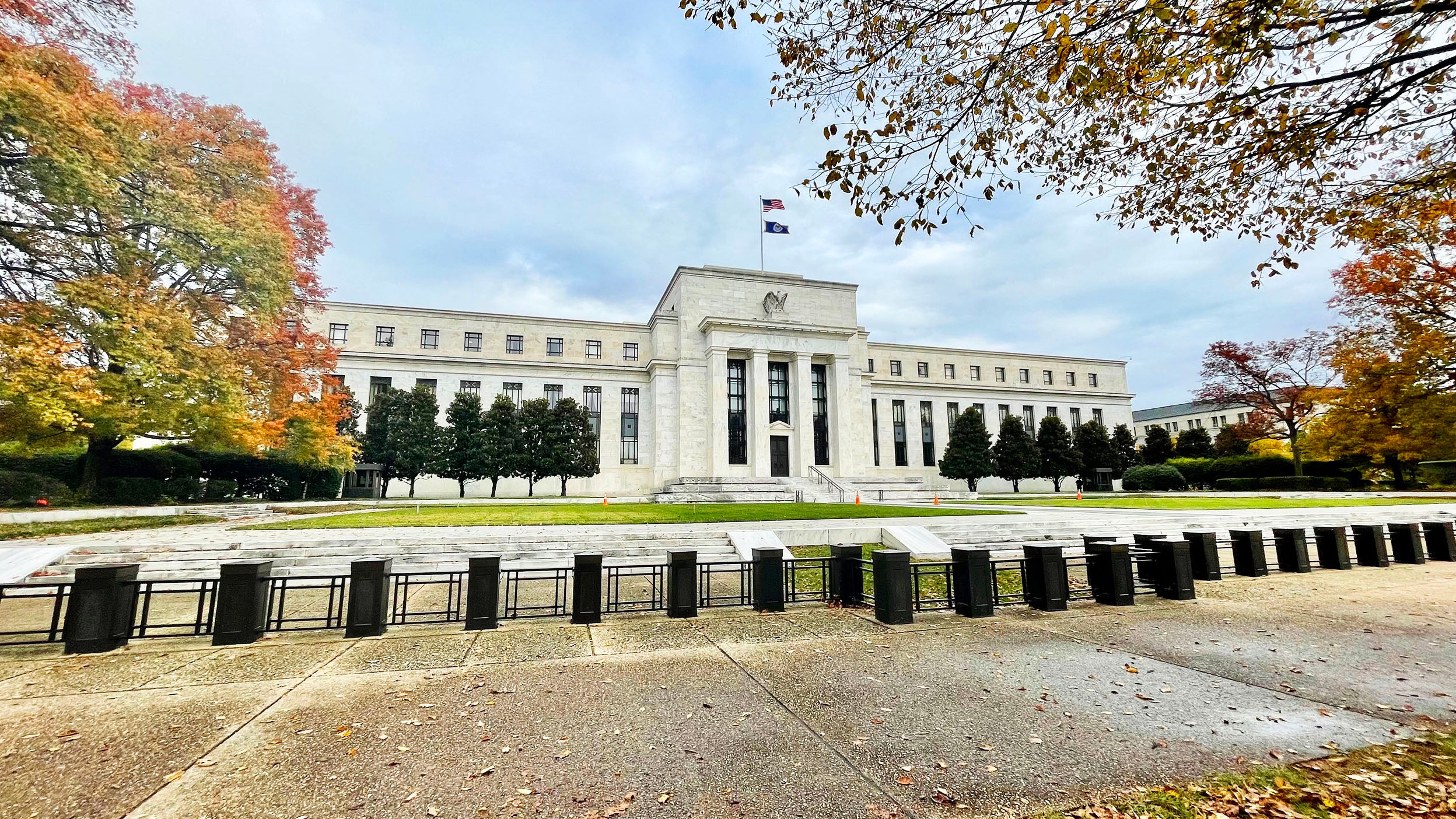 The Federal Reserve building with fall foliage