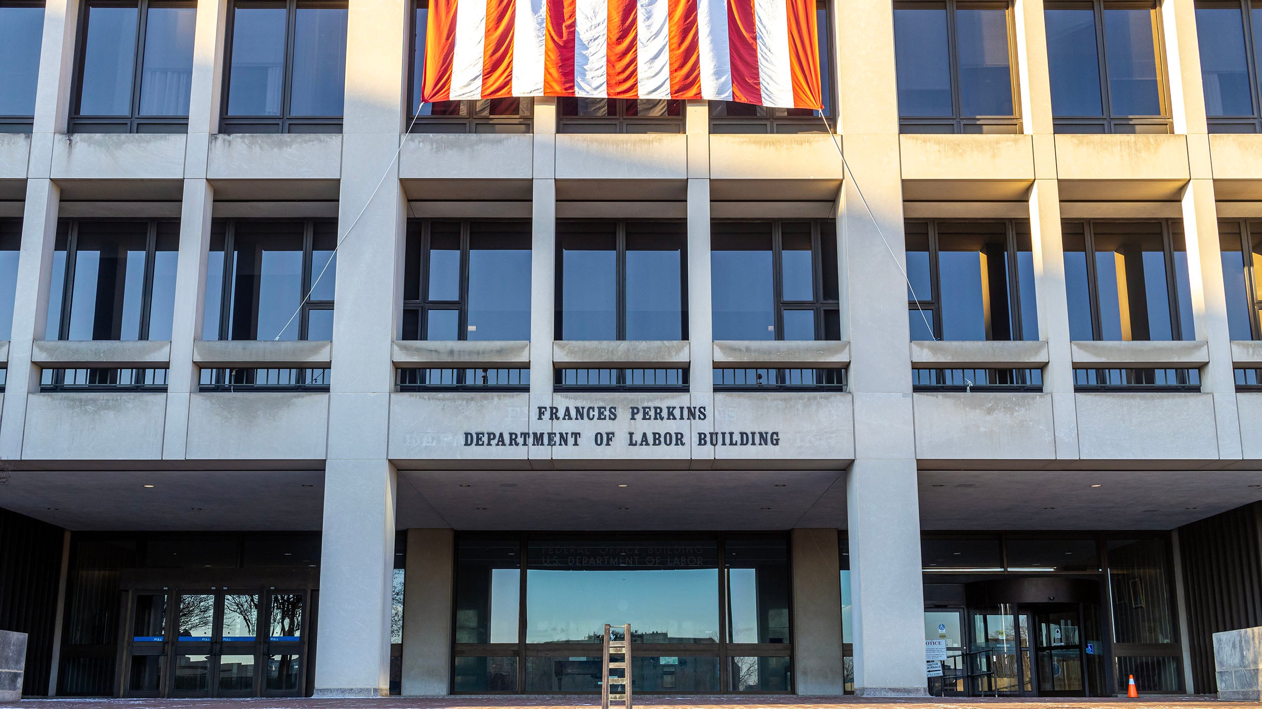 Overhead of athletes running together on the street