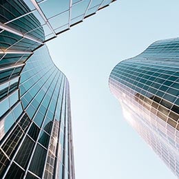 Point%20of%20view%20from%20below%20of%20a%20futuristic%20and%20curved%20building.