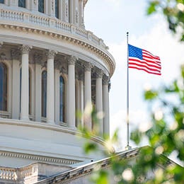 Close-up%20view%20of%20the%20American%20Flag%20on%20the%20US%20Capitol%20building%20in%20Washington%20D.C.%20on%20the%20East%20Façade